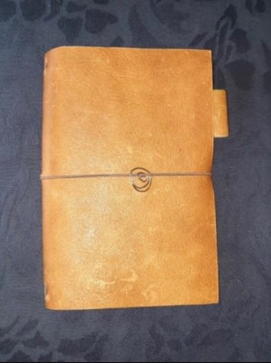 Handmade leather personal size notebook passport diary holder 17cm x 11cm with 4 elastics to hold your notebooks diaries etc and also a pen loop and a handmade notebook also FREE STANDARD POSTAGE INCLUDED