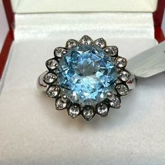 A beautiful vintage silver ring with Sky Blue Topaz and White Topaz.