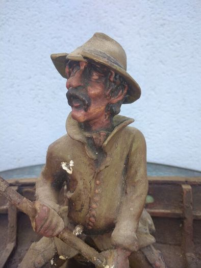 Antique fisherman and boat