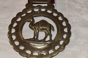 Antique solid brass camel medallion