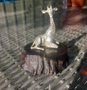 Sterling silver giraffe on Zimbabwean wood, by Patrick Mavros, D18 post 8e