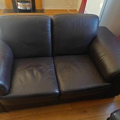2 brown leather sofas