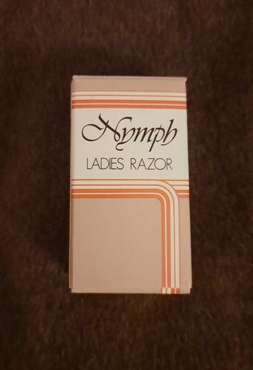 ladies vintage nymph razor with two razor blades in original packaging circa 1960's in excellent condition with no issues FREE STANDARD POSTAGE INCLUDED