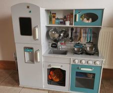 Wooden toy kitchen with accessories