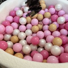 Luxury cream bouche ball pit with pink, white and gold balls
