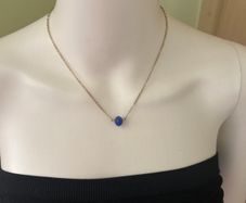 Gold tone and blue jewellery set