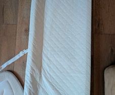 baby changing mat, bib and bath flower