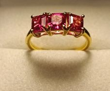 Stunning Lab Grown Padparasha Sapphire Trilogy Ring.