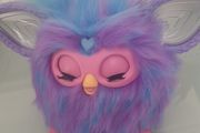 As new Furby .Only played with a few times .Child has no interested in it .Bought in Smyths last xmas Sings reacts to speech etc .20 euro .Paid 45euro .