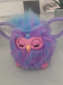 As new Furby .Only played with a few times .Child has no interested in it .Bought in Smyths last xmas Sings reacts to speech etc .20 euro .Paid 45euro .