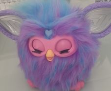 As new Furby .Only played with a few times .Child has no interested in it .Bought in Smyths last xmas Sings reacts to speech etc .20 euro .Paid 45euro .