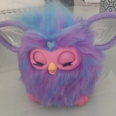 As new Furby .Only played with a few times .Child has no interested in it .Bought in Smyths last xmas Sings reacts to speech etc .20 euro .Paid 45euro .
