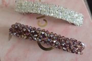 Set of 2 beautiful crystal beaded hair clips  one clear/white and one pink/purple. Sparkly and elegant design, perfect for everyday wear or special occasions. In very good condition.