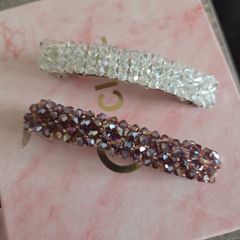 Set of 2 beautiful crystal beaded hair clips  one clear/white and one pink/purple. Sparkly and elegant design, perfect for everyday wear or special occasions. In very good condition.