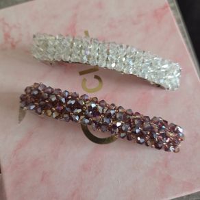 Set of 2 beautiful crystal beaded hair clips  one clear/white and one pink/purple. Sparkly and elegant design, perfect for everyday wear or special occasions. In very good condition.
