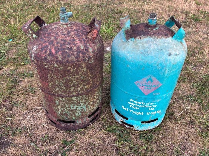 2 empty gas cylinders