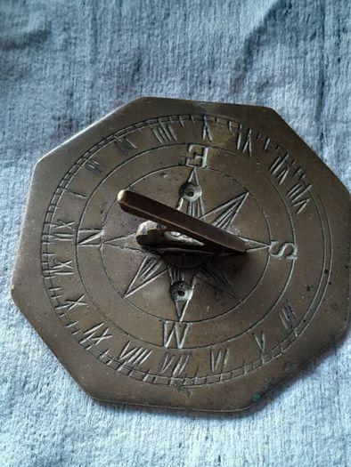 old miniature sundial
