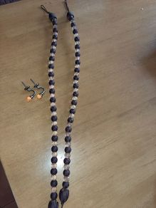 curtain tie backs and hooks. brown & orange