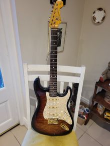 SX quilted sunburst electric guitar