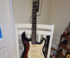 SX quilted sunburst electric guitar
