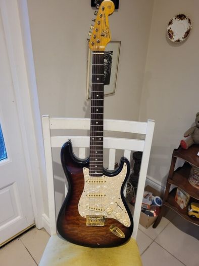 SX quilted sunburst electric guitar