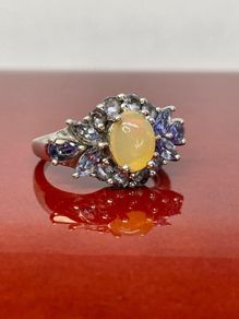 Silver ring with Opal and Lolite