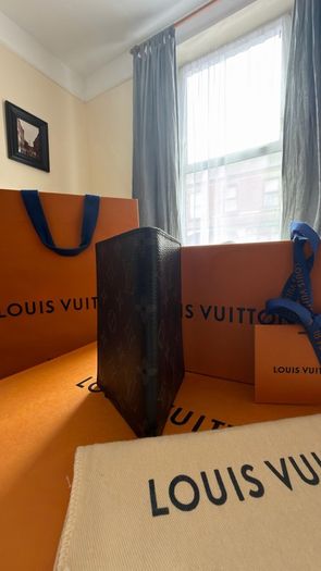 Louis Vuitton passport holder