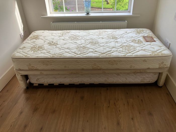 Single bed with pullout bed underneath