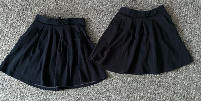 Navy M and S jersey skirts