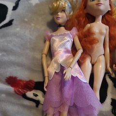 4 barbie dolls