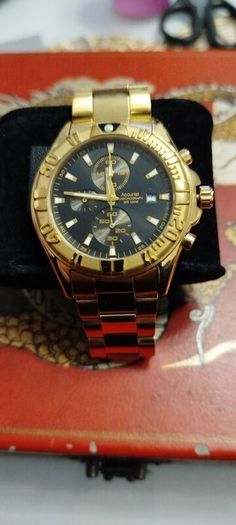 accurist mems gold tone watch