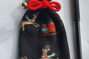 A Cute Knitted Christmas Pouch with Red Bow - E