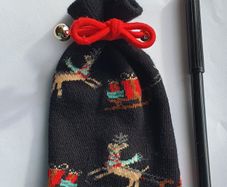 A Cute Knitted Christmas Pouch with Red Bow - E