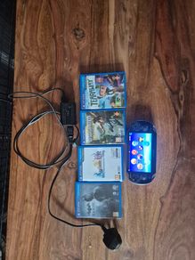 PlayStation vita with four games and a 4gb memory card