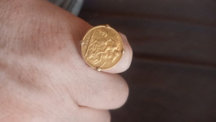 half sovereign ring