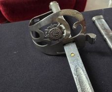 Irish Army sword with Nickle plate guard .