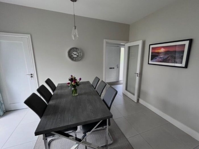 6 grey leather effect dining chairs