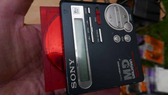 Sony MZ-R700 Portable Minidisc Walkman Player In Good Working Condition (charger and a large Minidiscs set)