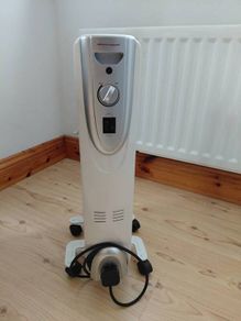 Winterwarm Oil Filled Radiator Heater. Portable 5 Fin Electric Heater