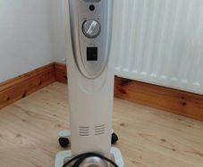 Winterwarm Oil Filled Radiator Heater. Portable 5 Fin Electric Heater
