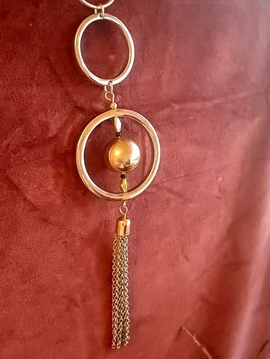 Long two-tone and tassel necklace