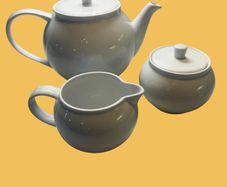 Teapot, milk jug and sugar bowl