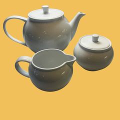 Teapot, milk jug and sugar bowl
