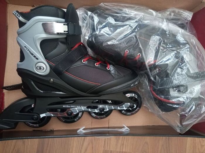Man roller skates.