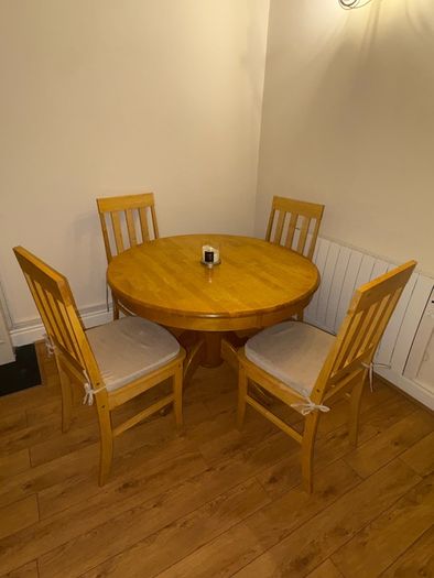 Round solid pine dining table with 5 chairs