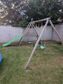 double swing set and slide