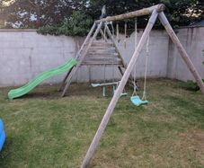 double swing set and slide