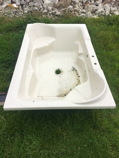 Large rectangular Acrylic bath.