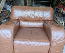 Brown leather armchair