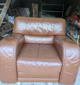 Brown leather armchair